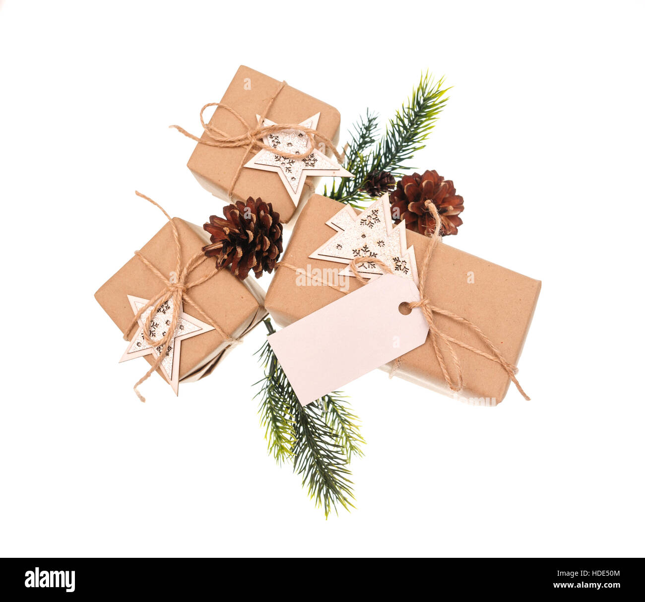gift boxes tied with a rope wooden stars on white background Stock ...
