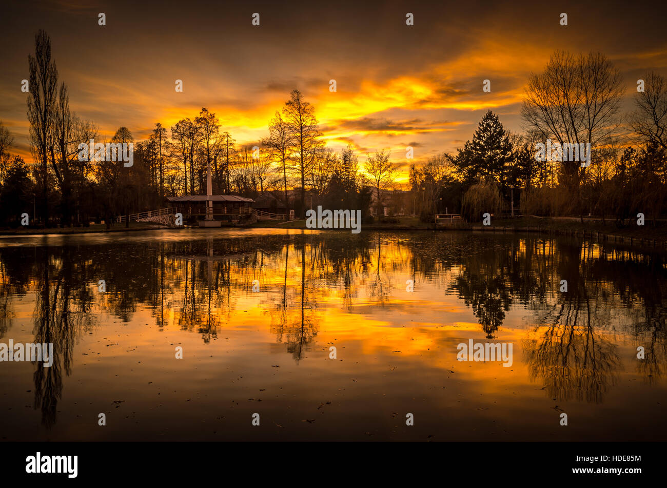 Beautiful autumn landscape. Sunset over a forest lake Stock Photo - Alamy