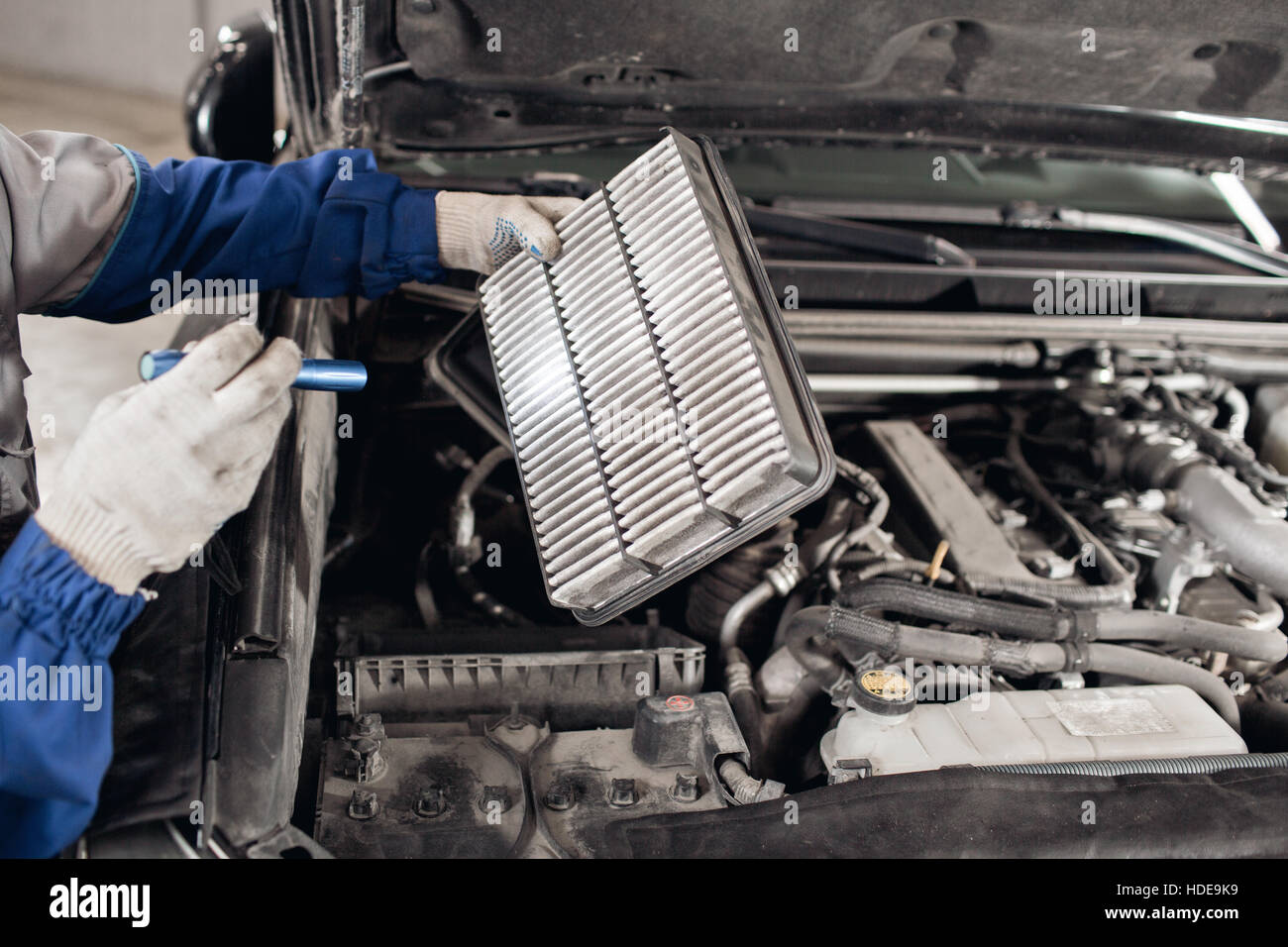 Car mechanic symptoms analysis part air filter of engine for