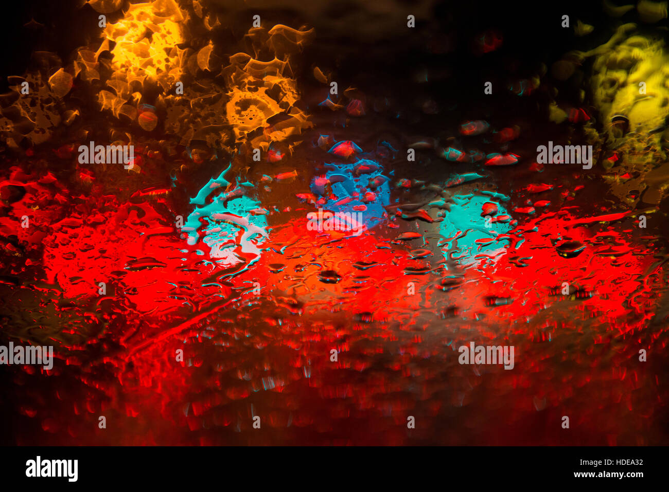 Rain drops on window with street bokeh lights Stock Photo - Alamy