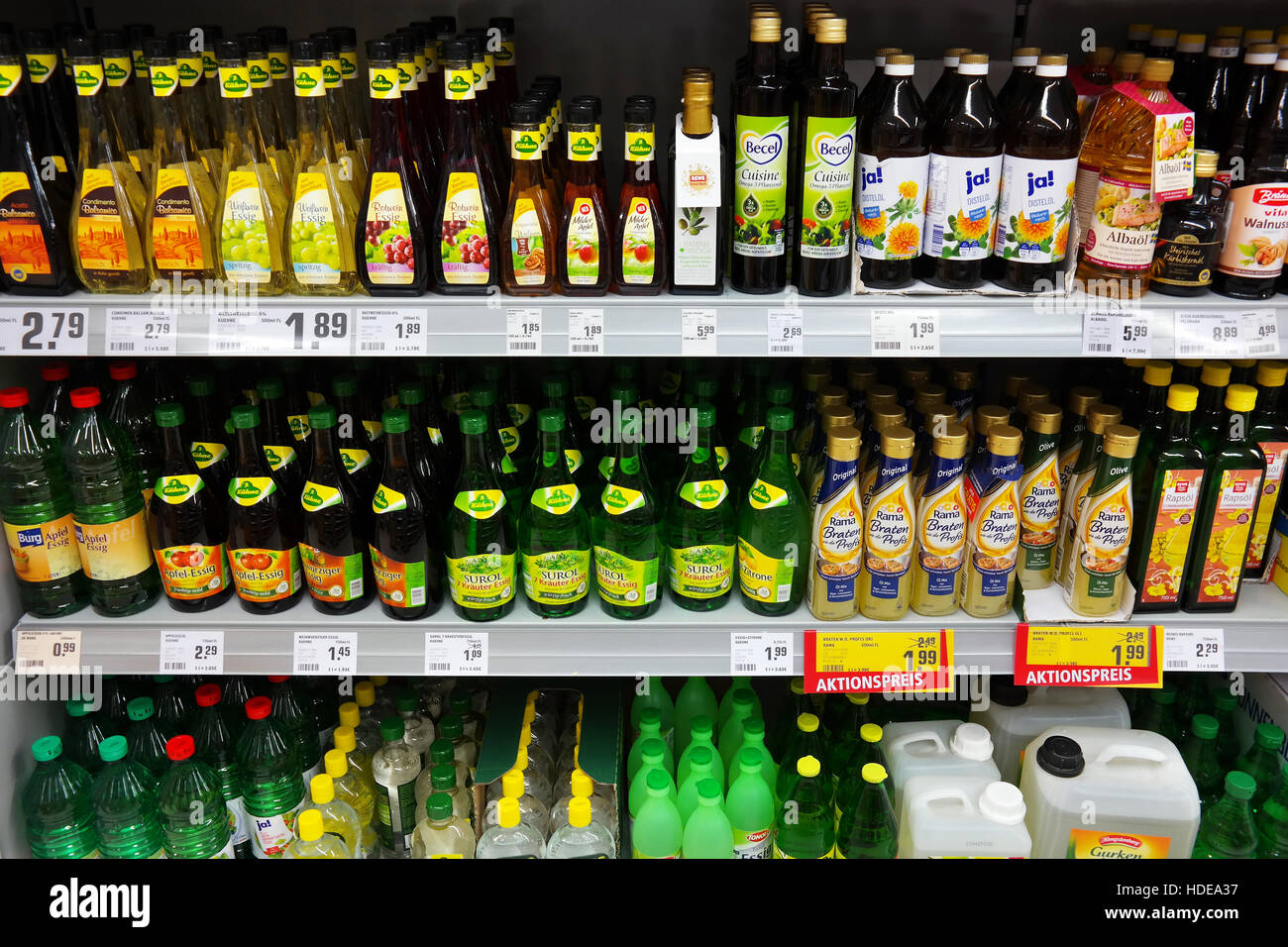 Oil and vinegar products in REWE supermarket Stock Photo Alamy