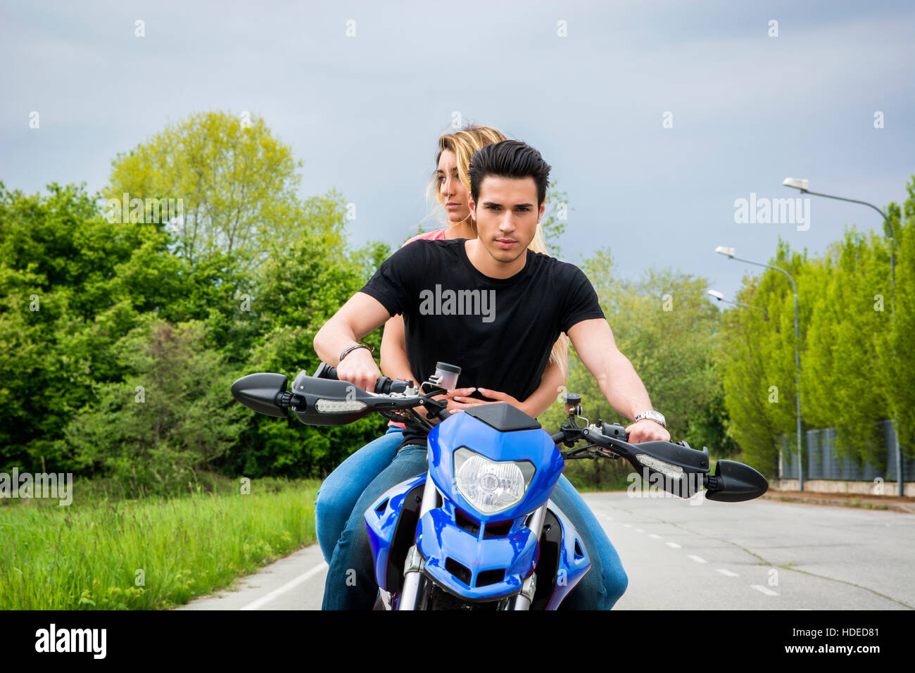 Man and woman riding motorcycle hi res stock photography and