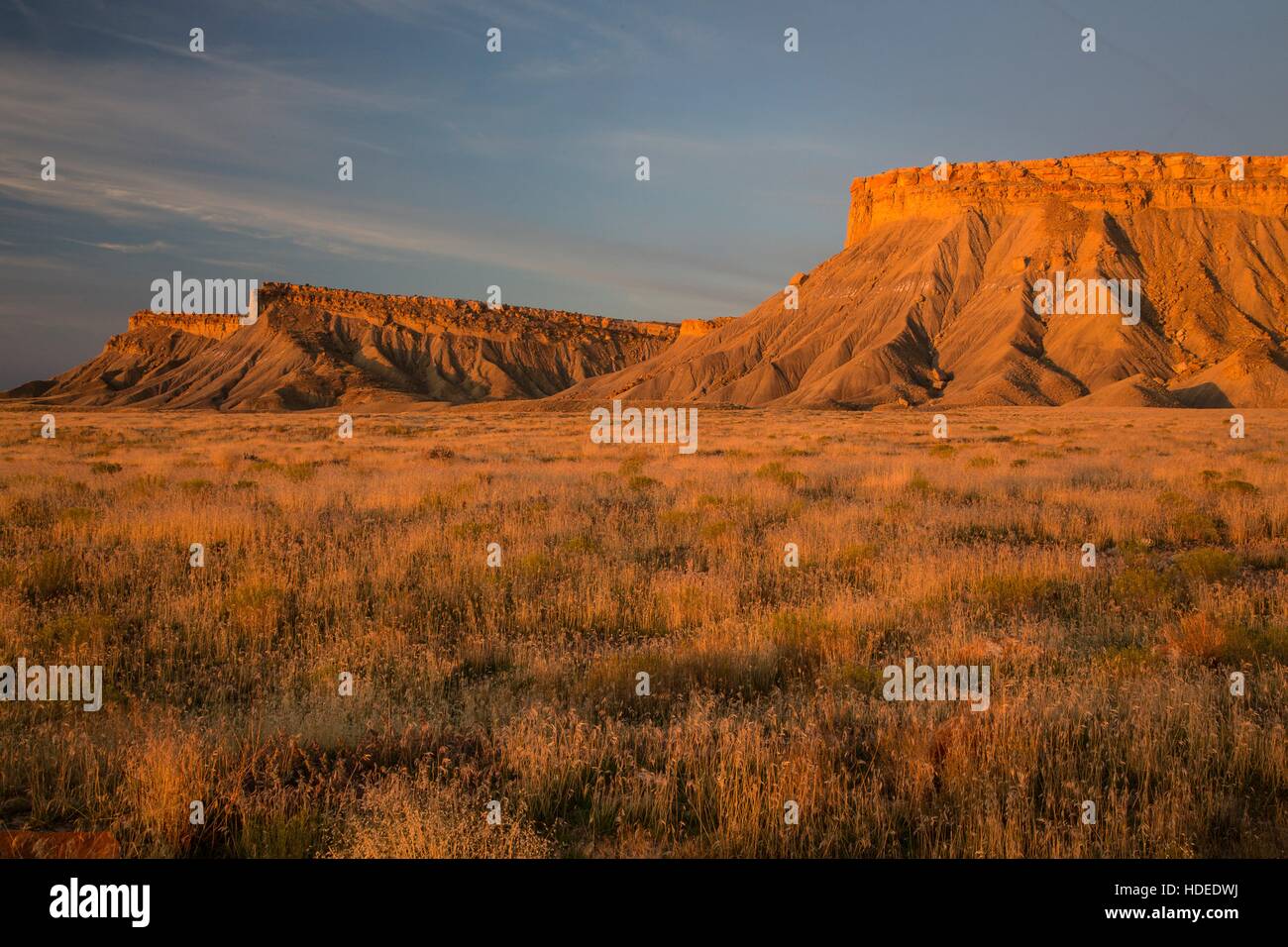 The sun sets over the Book Cliffs desert mountain range October 8, 2016 in Price, Utah. Stock Photo