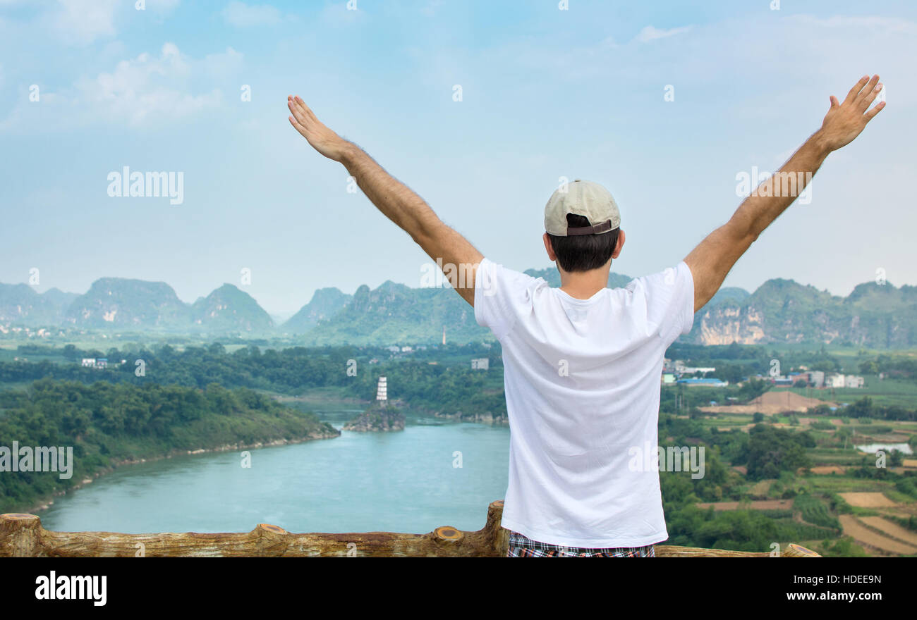 Man enjoying at the viewpoint. Outdoors lifestyle Stock Photo