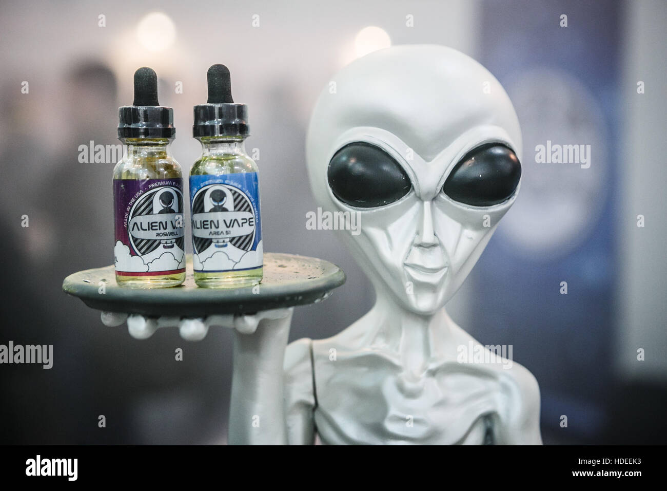 MOSCOW - 9 DECEMBER,2016: International Vape Expo.Alien action figure toy at ejuice sale stand Stock Photo