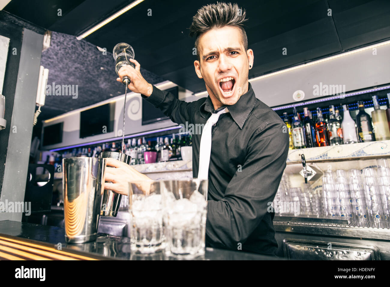 Flair bartender at work in a night club Barman mixing some cocktail in a bar Stock Photo Alamy