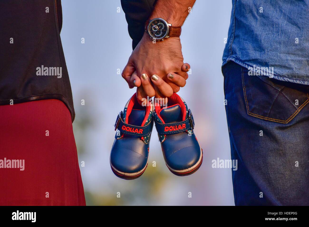 Maternity shoot of an eight month pregnant woman wearing a beautiful