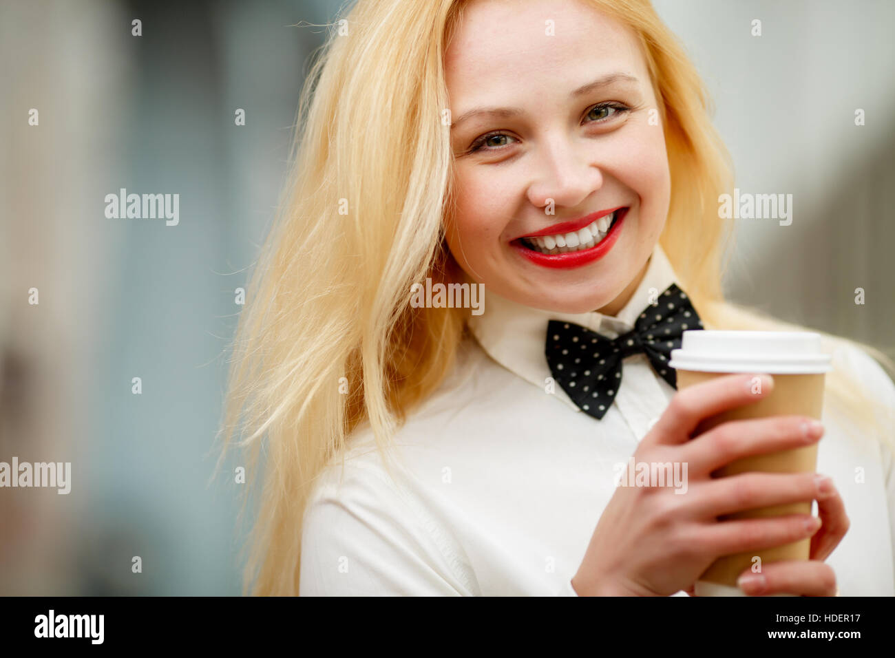 Ginger girl in bow tie Stock Photo Alamy