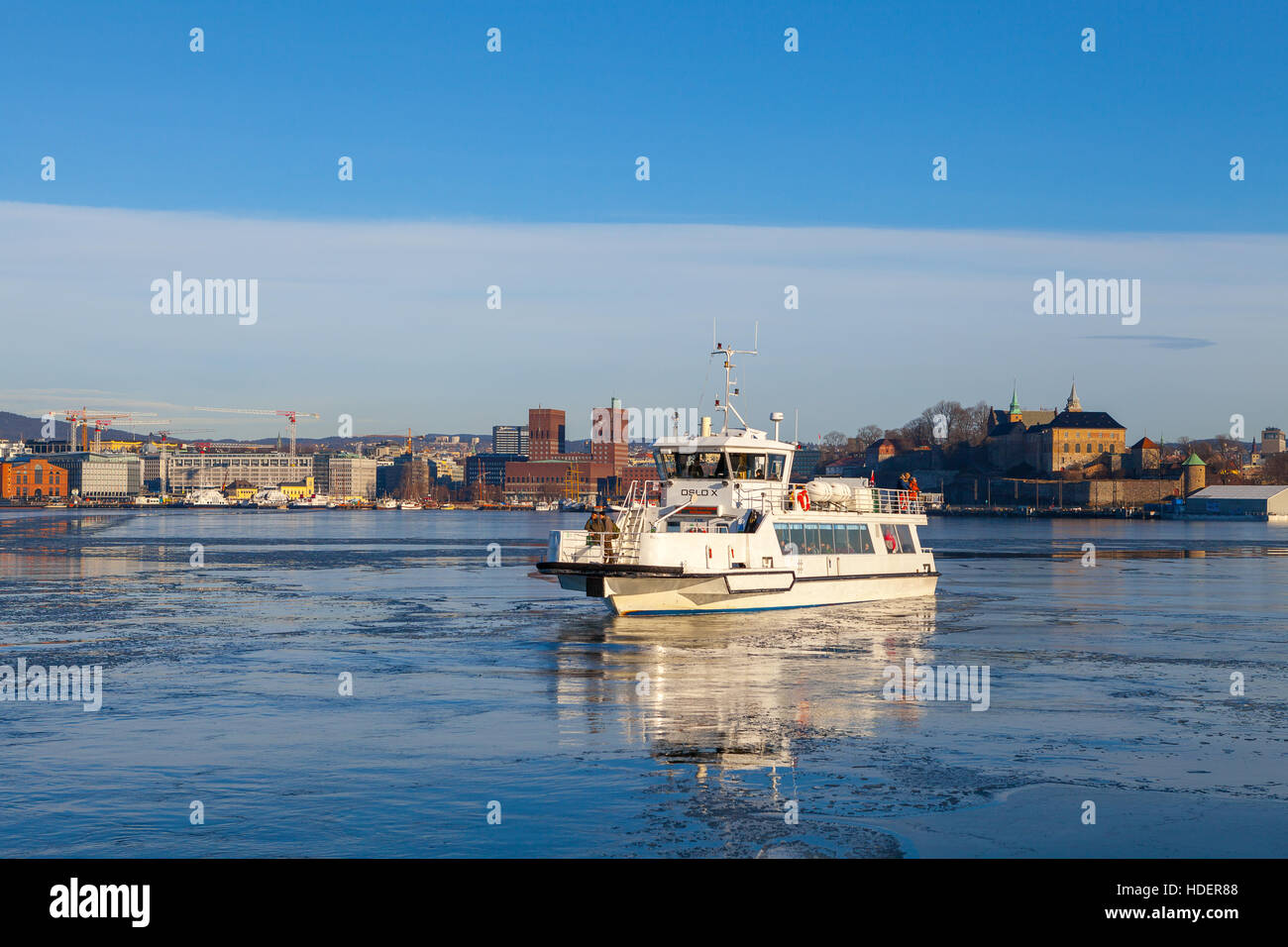 View of small ferry and Oslo waterfront from island Stock Photo