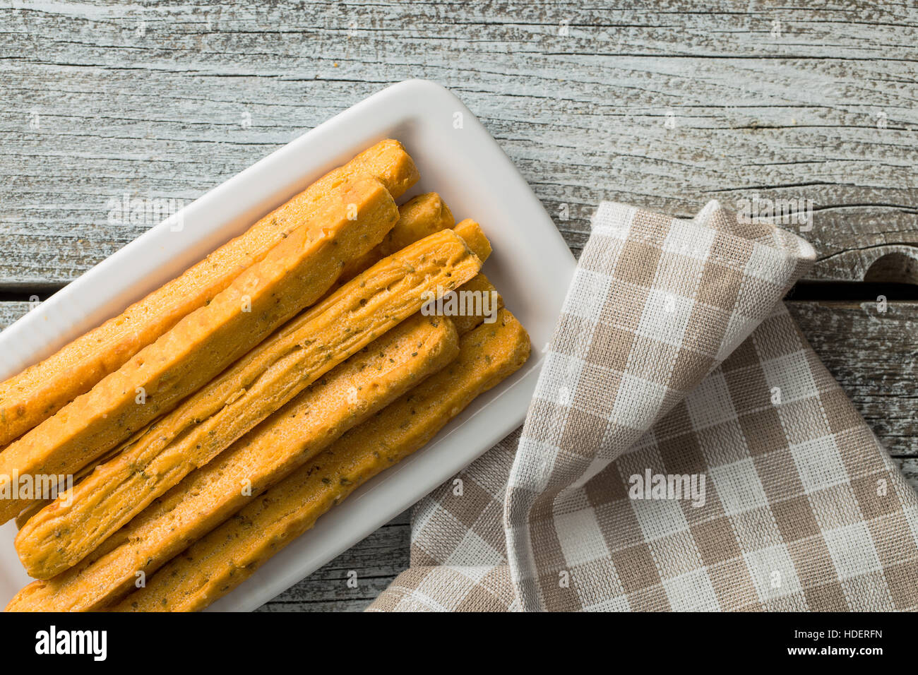 Crispy bread sticks on plate Stock Photo Alamy