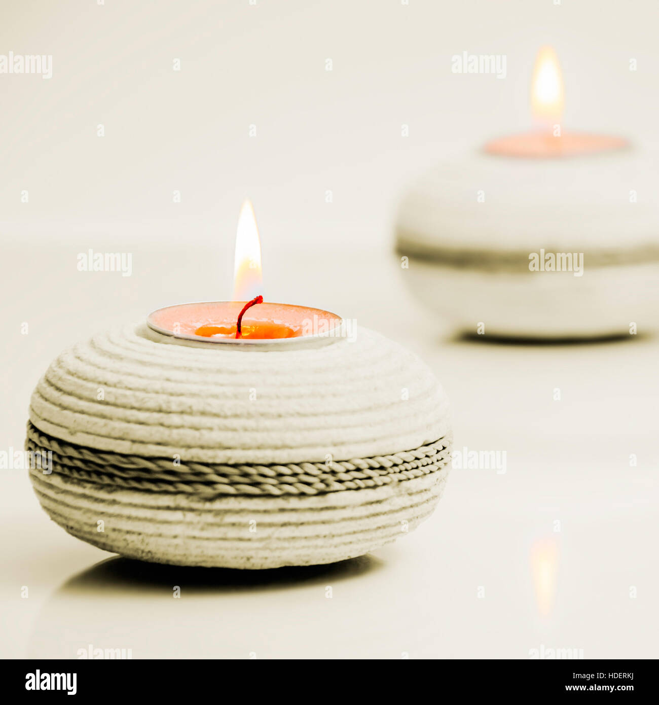 Round stone tea light holders spa concept square Stock Photo Alamy