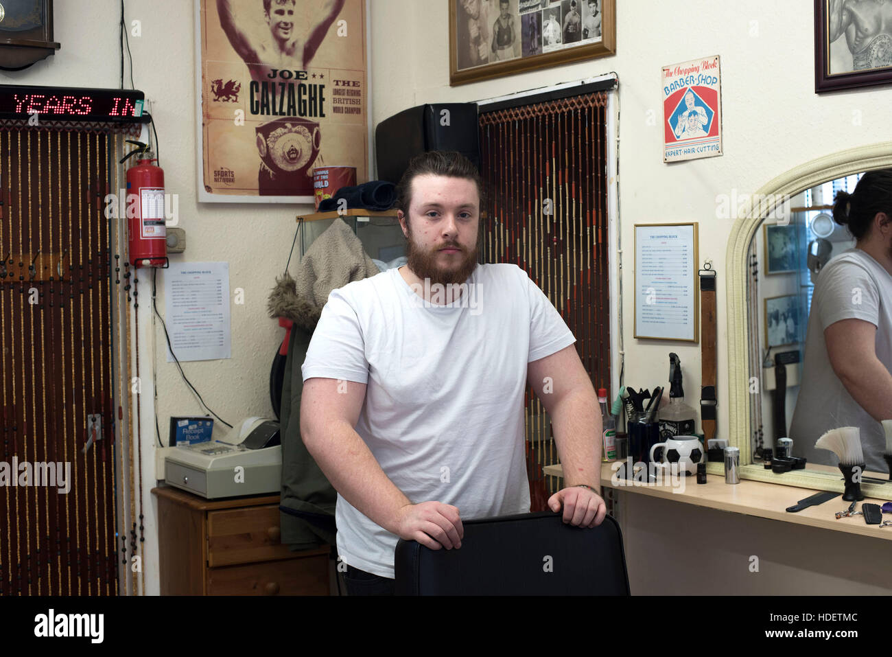 Caerphilly, Wales. November 2016. The Chopping Block Barber shop. Joe Black - Barber, photographed in his families barber shop. © Gemz Ali - Freelance Stock Photo