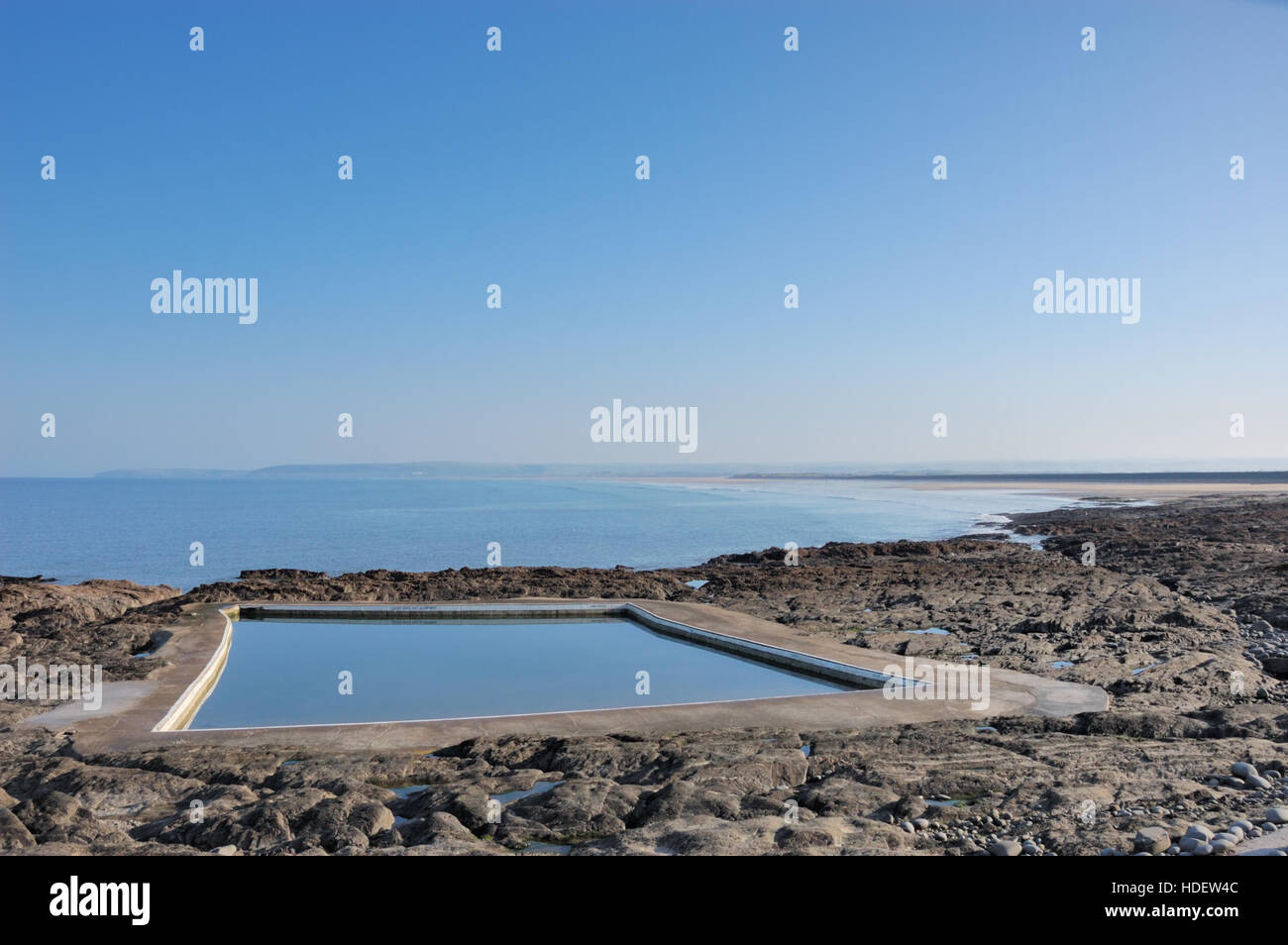 The tidal rock swimming pool at Westward Ho! on the North Devon coast. Stock Photo