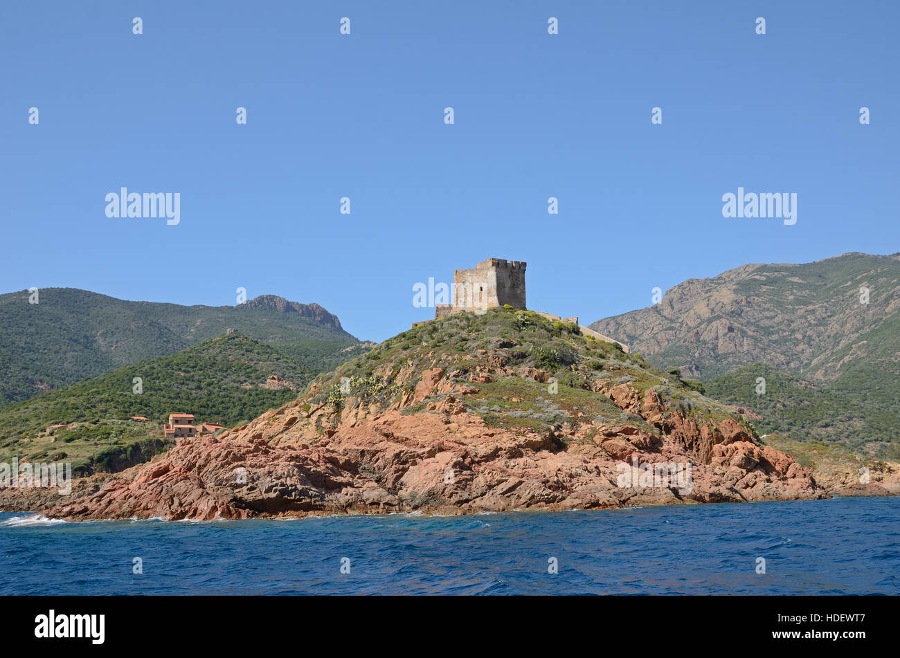 The coast with belfry in the Golfe de Girolata. Stock Photo