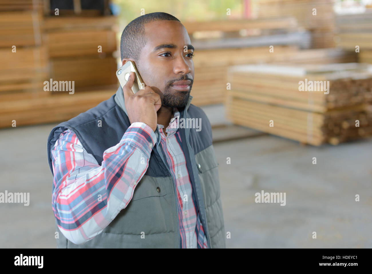 Man on telephone construction hi-res stock photography and images - Alamy
