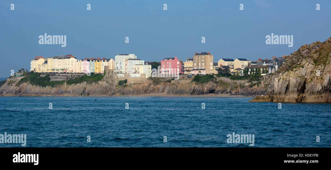 St Catherine's Island and The Esplanade, Tenby, with calm blue sea in the foreground. Stock Photo