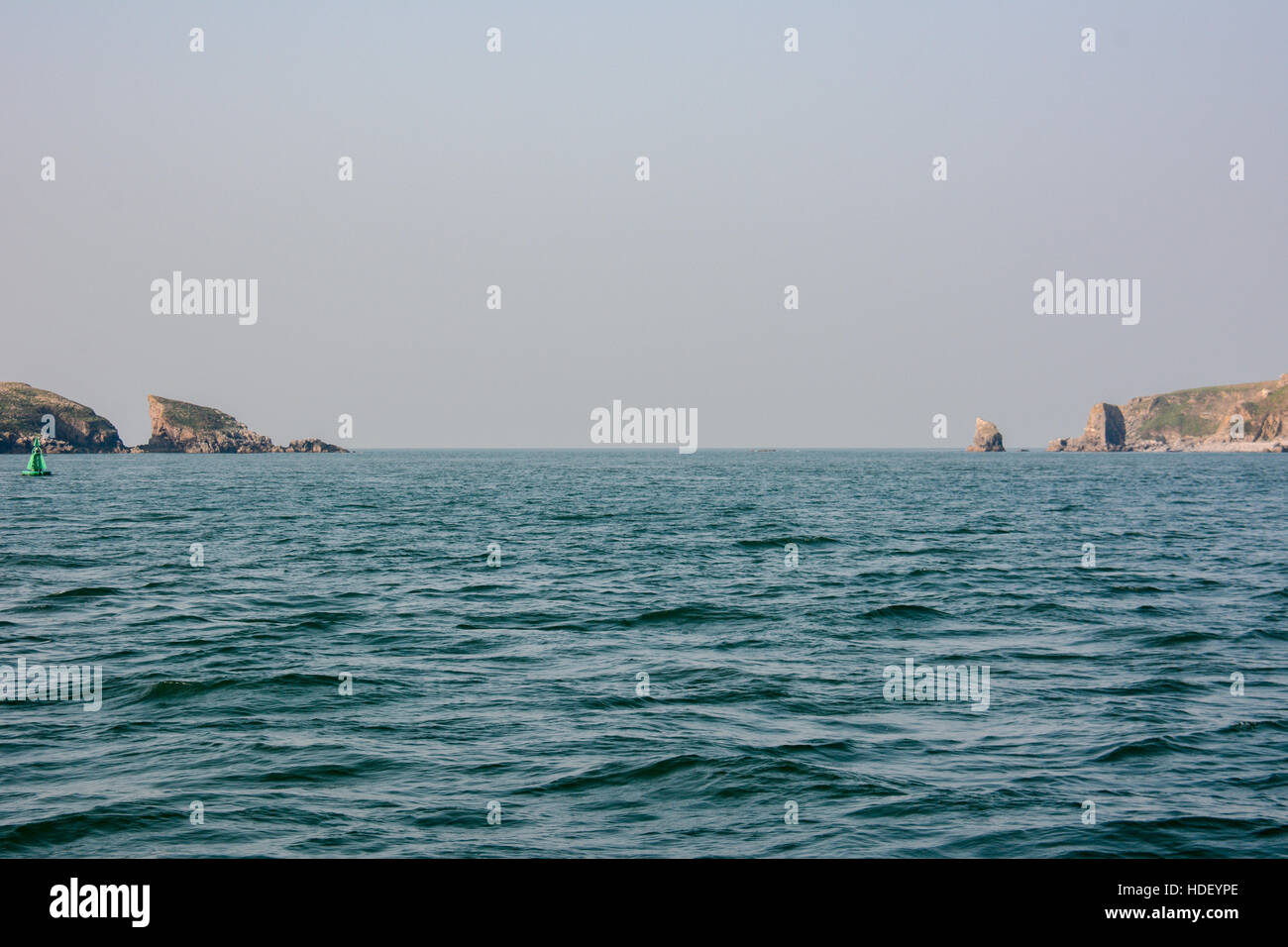 Caldey Sound on a calm day with ripples on the sea. Stock Photo