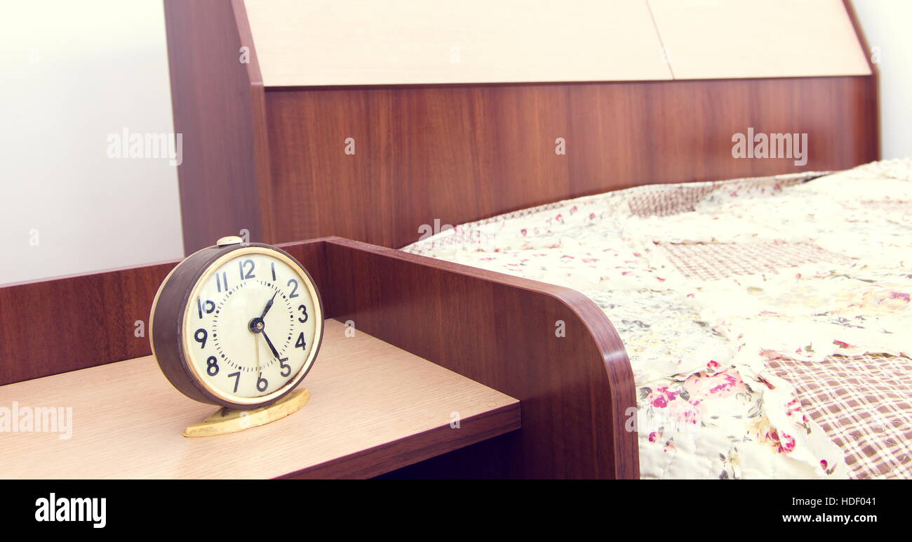 alarm clock in the bedroom Stock Photo Alamy