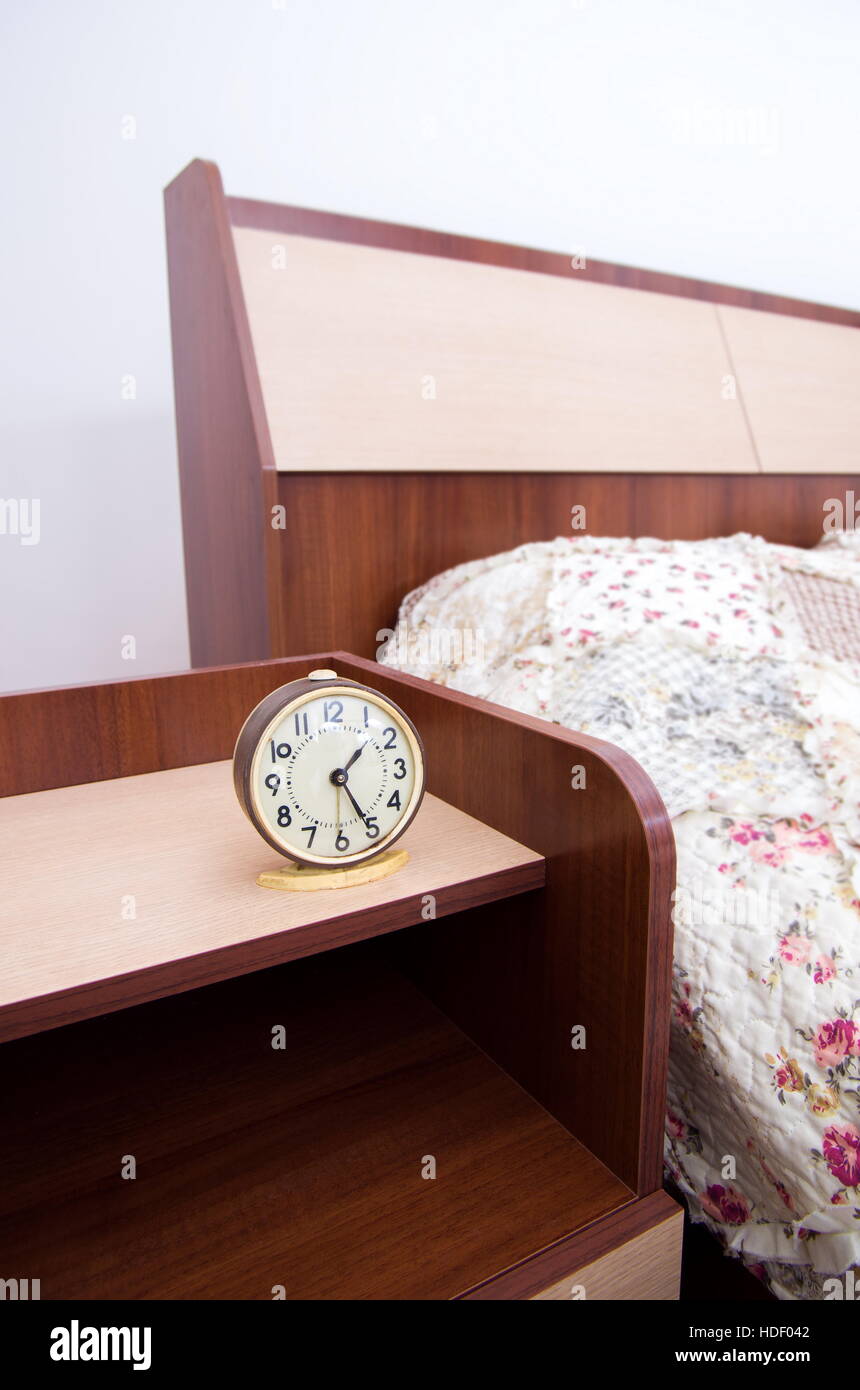 alarm clock in the bedroom Stock Photo Alamy