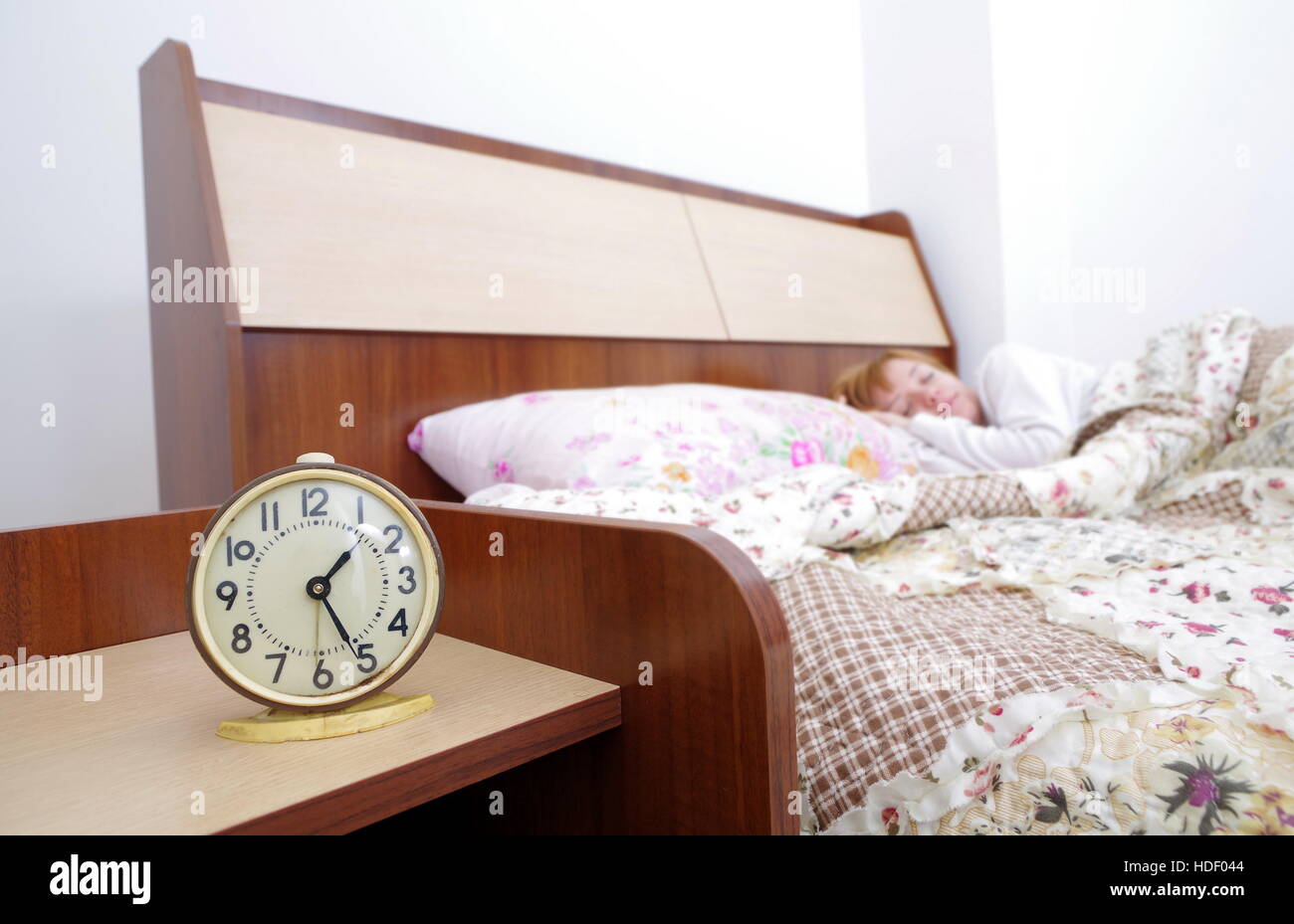 alarm clock in the bedroom Stock Photo Alamy