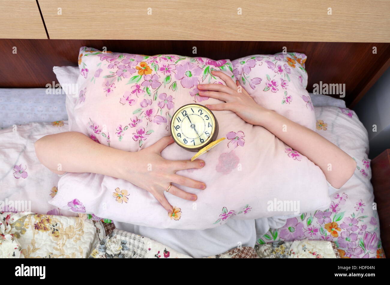 woman and alarm clock in the bedroom Stock Photo Alamy