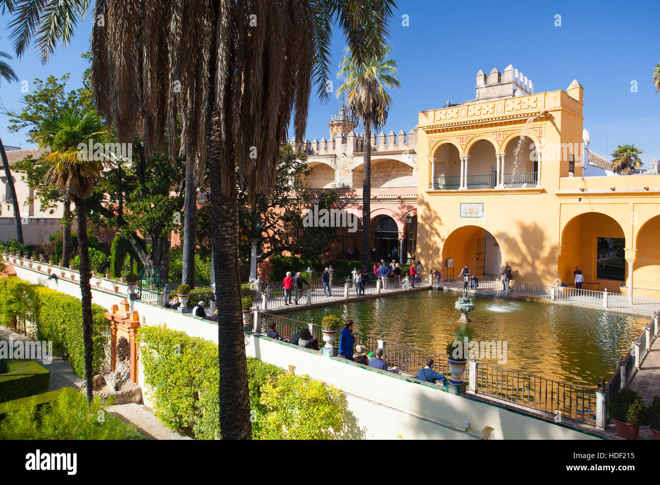 Seville, Spain - November 18,2016: Real Alcazar Gardens in Seville.The Alcazar of Seville is a royal palace in Seville, Spain, originally developed by Stock Photo