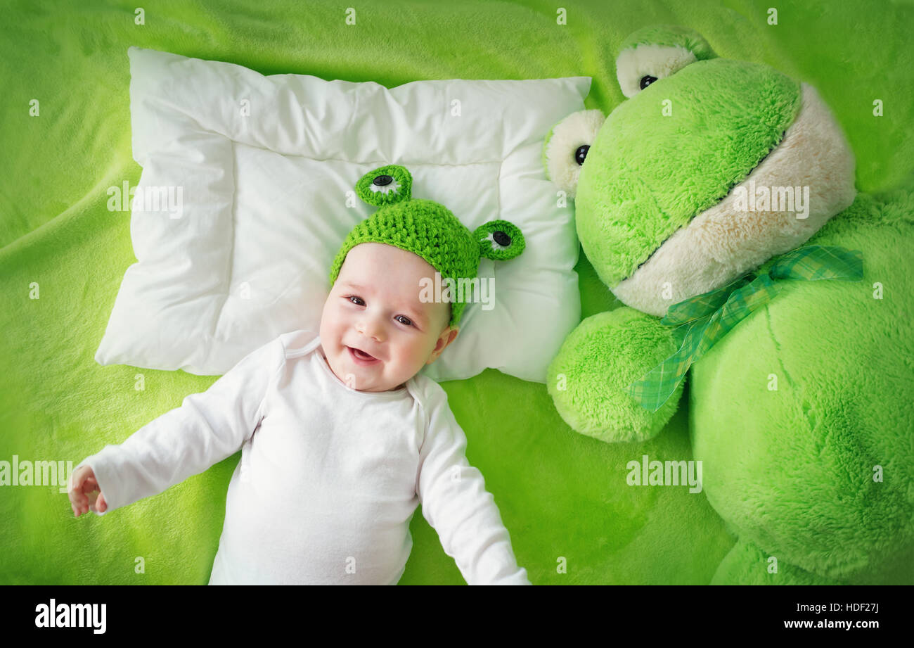 Baby on green blanket Stock Photo Alamy