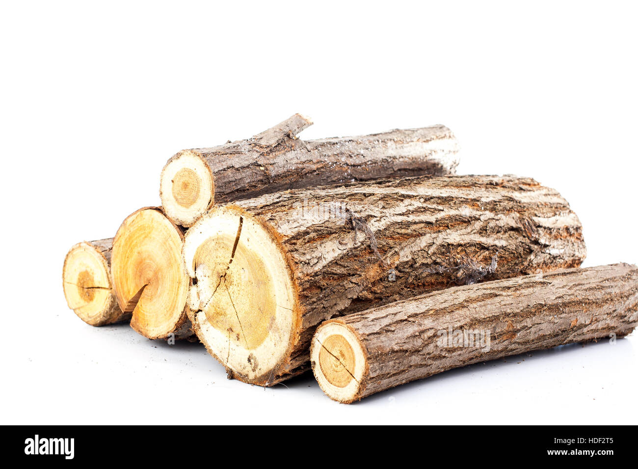 Pine logs on white background. Studio photo. Split wood. Oak tree for  winter time heating. Cross section of tree trunk.Firewood ready for burning  Stock Photo - Alamy