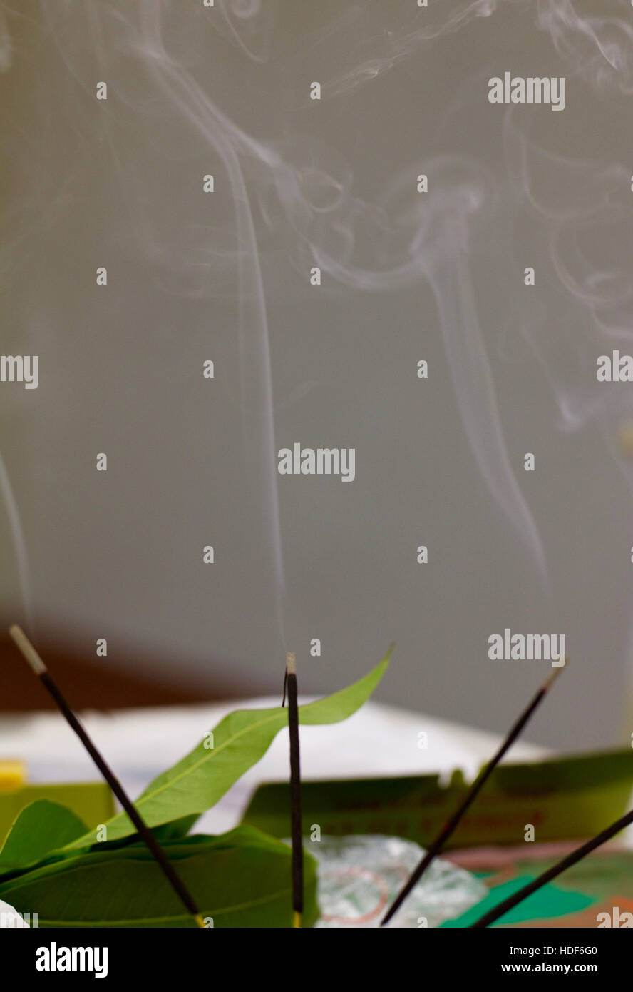 Lit incense sticks (agarbatti) used during puja (prayer) in various Indian festivals such as