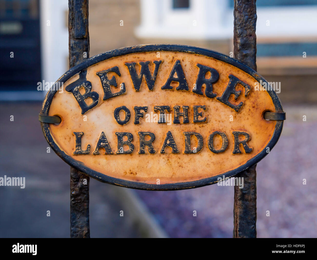 Garden Gate Warning Sign Beware of the Labrador Stock Photo