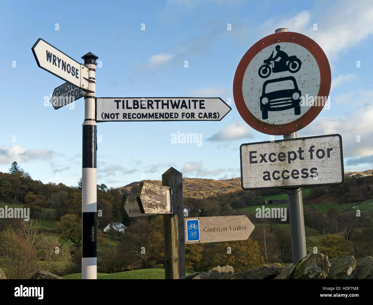 A cluster of signposts, Little Langdale, Lake District, Cumbria, England, UK. Stock Photo