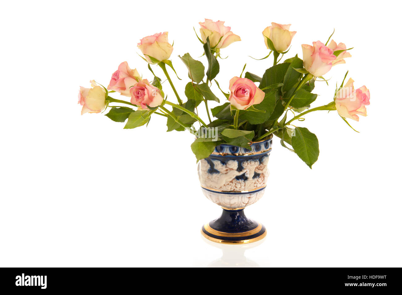 Bouquet pink roses in classic vase isolated over white background Stock ...