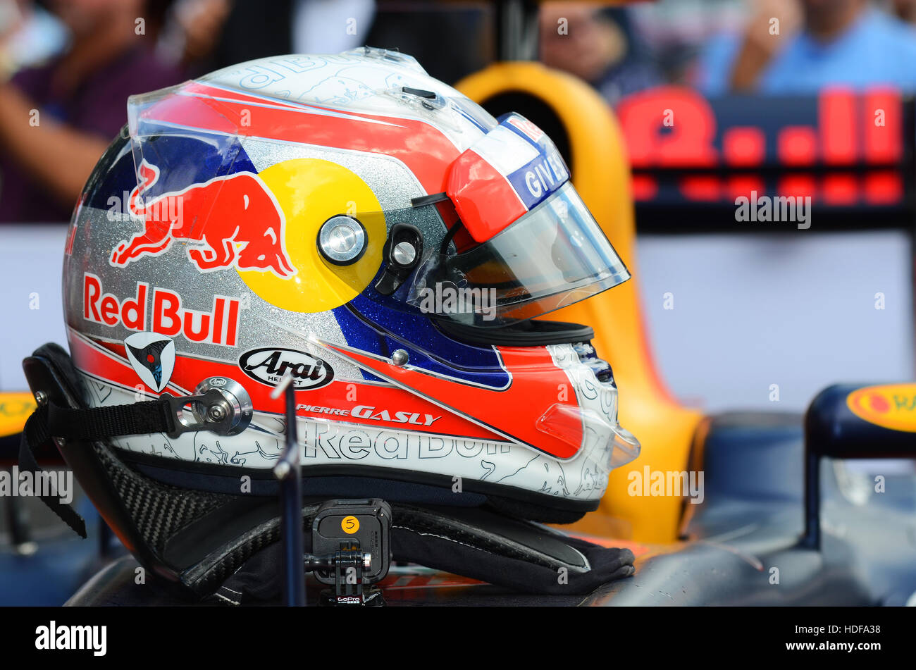 The helmet of Pierre Gasly who was preparing to drive a Red Bull Renault RB8 up the 2016 Goodwood Festival of Speed hill climb Stock Photo