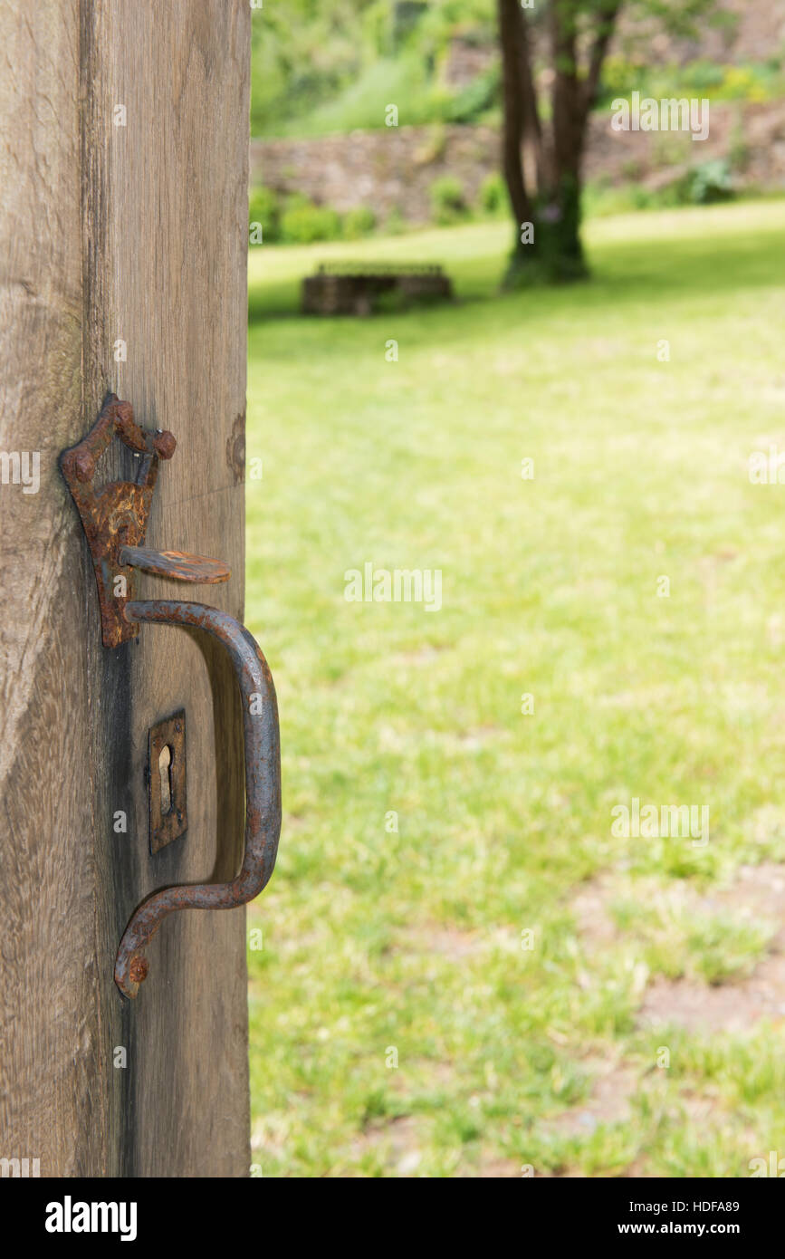 Old open door to the garden Stock Photo - Alamy
