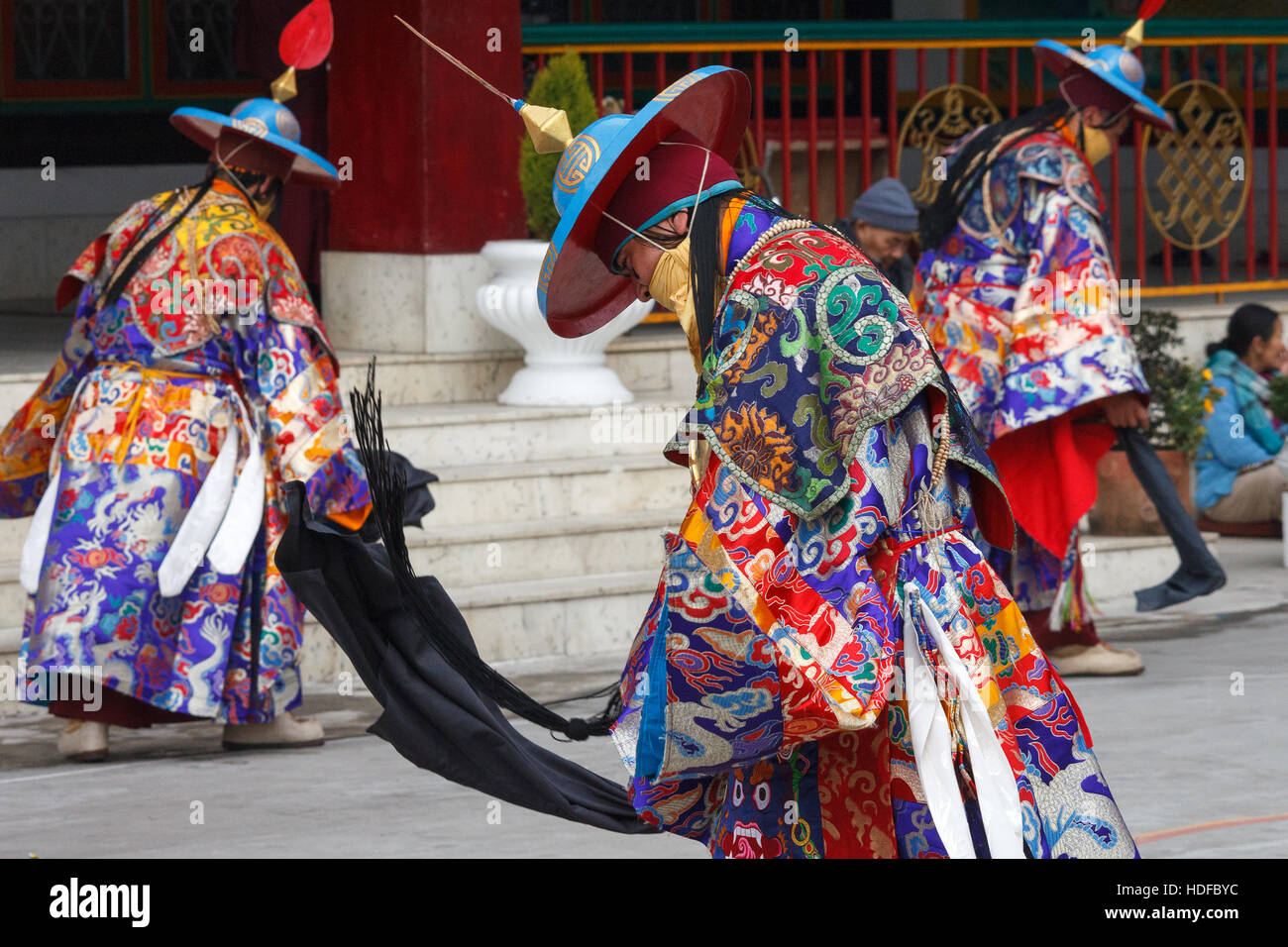 The Cham dance perfomed by tibetan monks during Losar (Tibetan New Year) in Druk Sangag Choling Monastery near Darjeeling, India Stock Photo