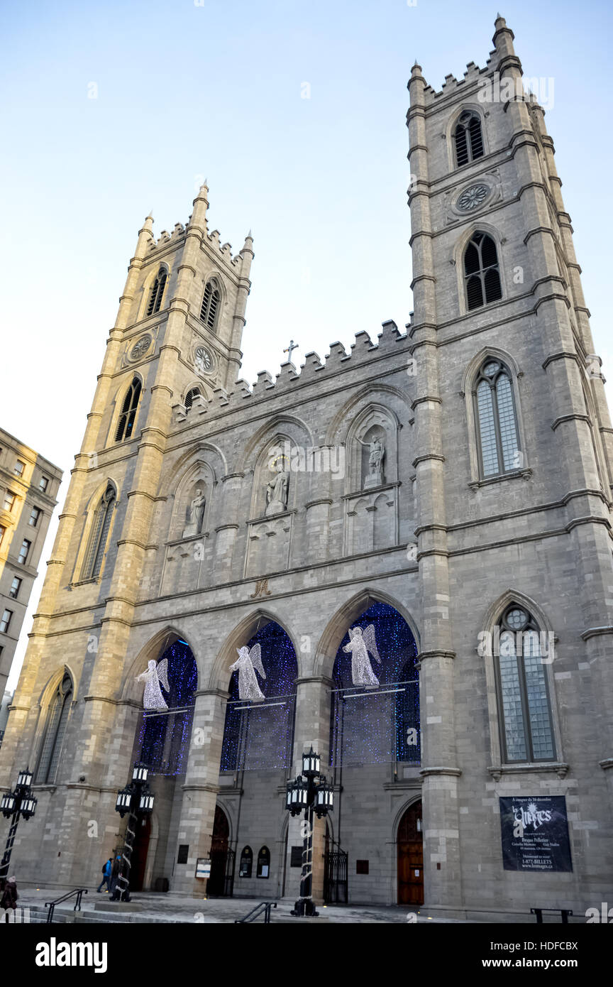 Basilica Notre Dame with three angels in winter  in Montreal, Canada. Stock Photo