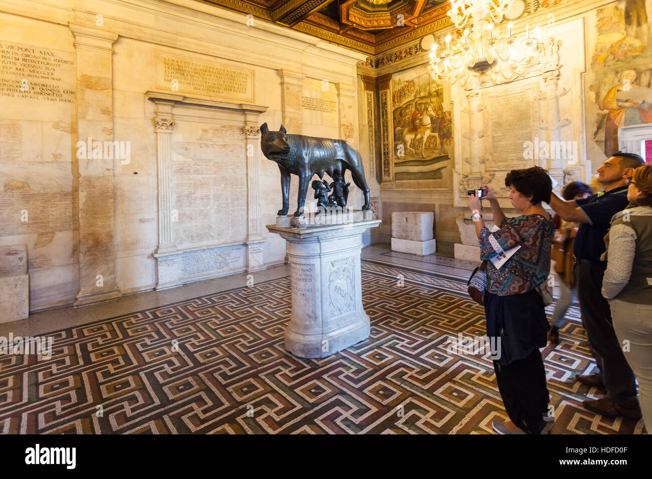 ROME, ITALY - OCTOBER 31, 2016: tourists in room of Capitoline Museums in Palazzo dei Conservatori (Palace of the Conservators) in Rome. Art and Arche Stock Photo