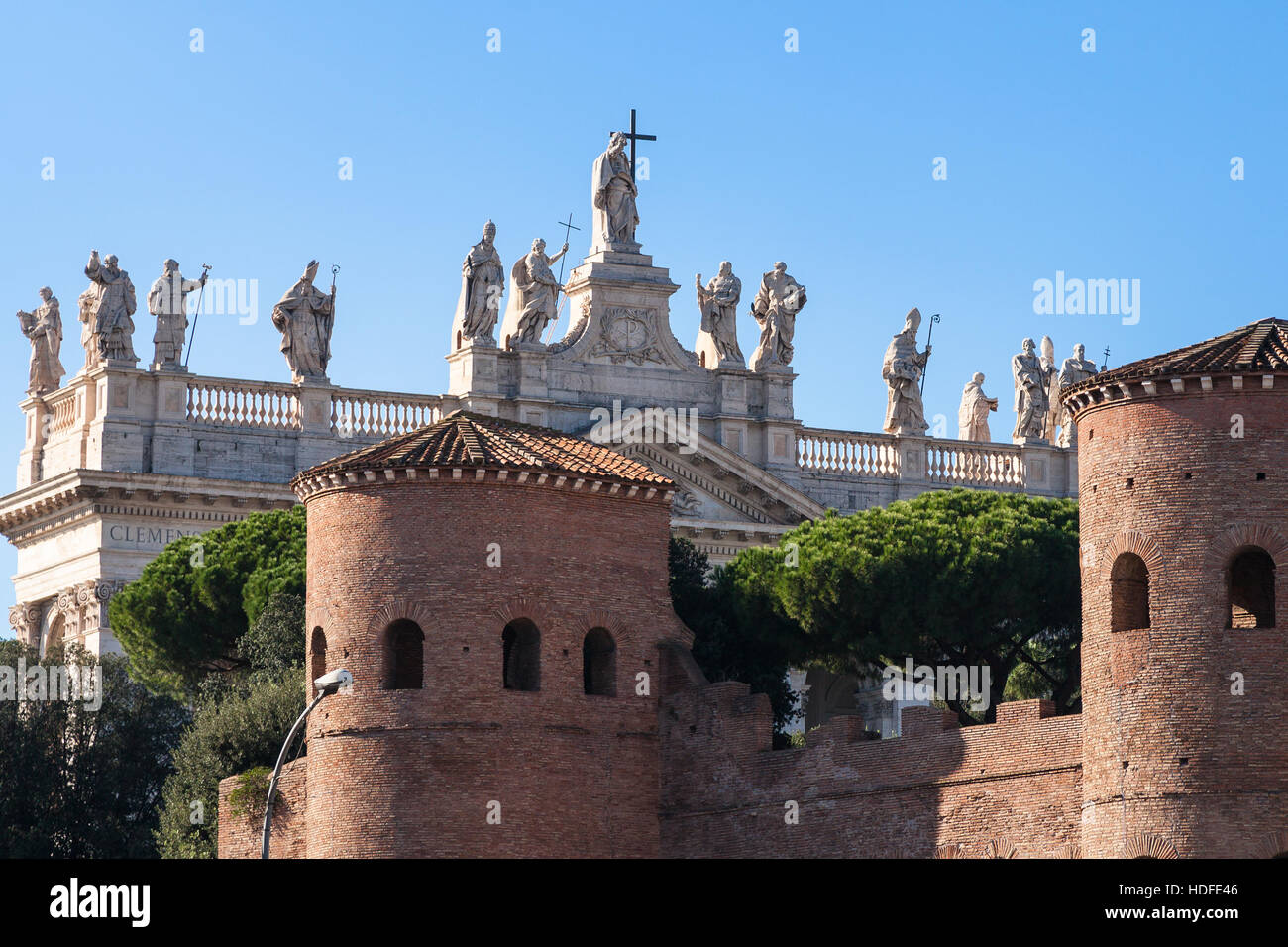 travel to Italy - Aurelian Wall and Papal Archbasilica of St. John in Lateran (Basilica di San Giovanni in Laterano) in Rome city Stock Photo