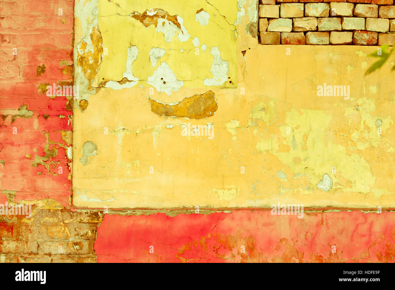 Old painted brick wall background weathered Stock Photo - Alamy