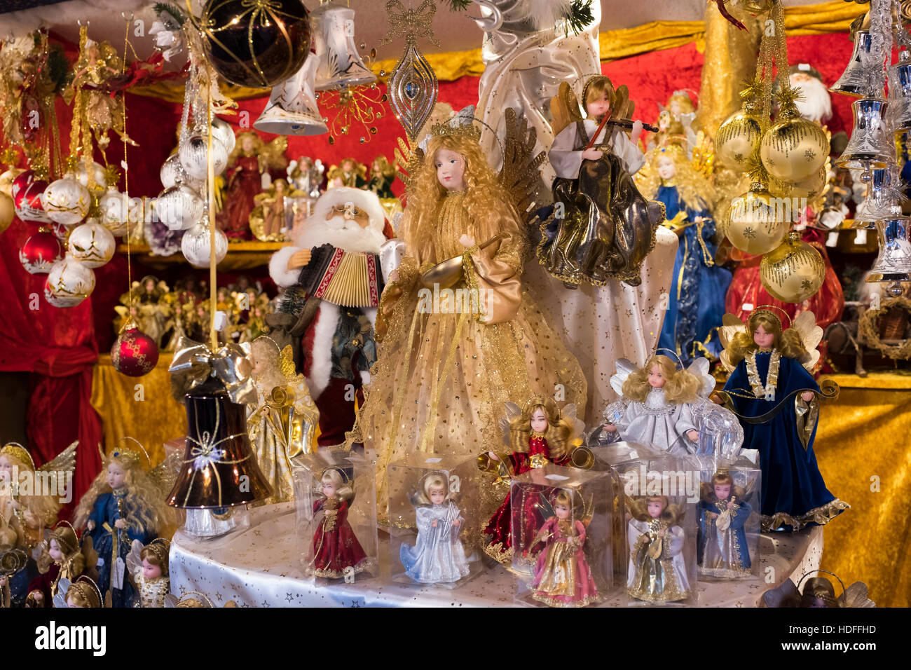 Various angel figurines at market stall, Christmas decorations