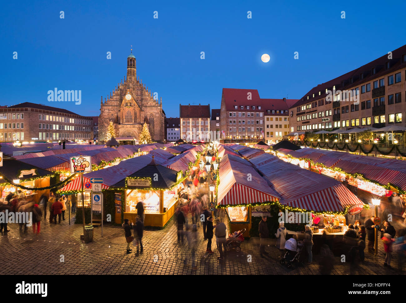 Nuremberg Christmas Market with Church of Our Lady at full moon, night scene, Nuremberg, Middle Franconia, Franconia, Bavaria Stock Photo