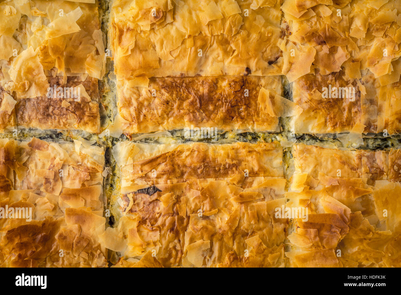 Greek pie spanakopita background Stock Photo
