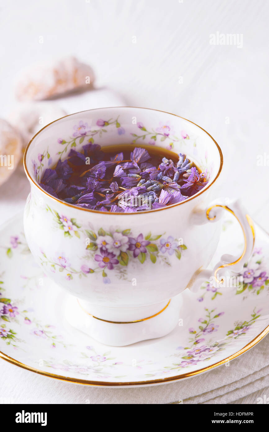 Beautiful cup of tea with flowers vertical Stock Photo