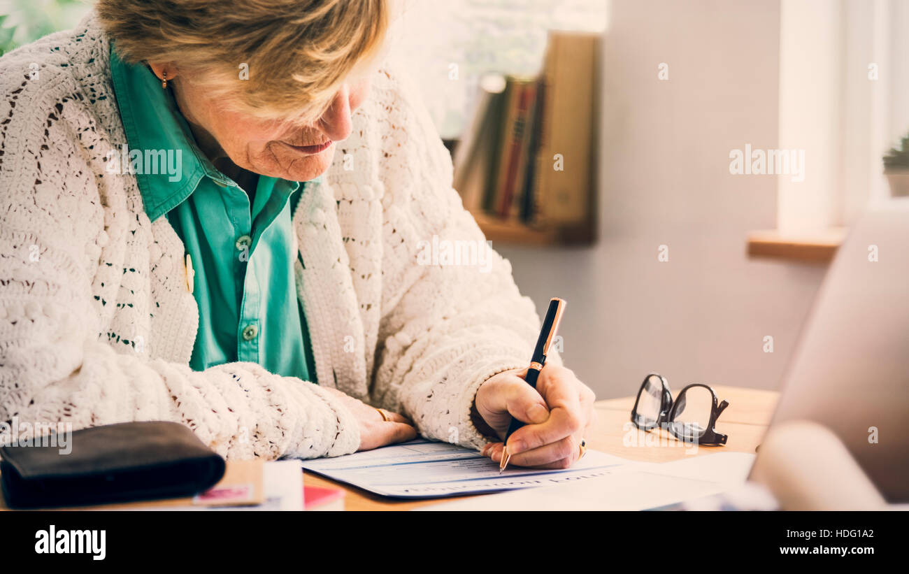 Application Form Filling Paperwork Senior Adult Concept Stock Photo - Alamy