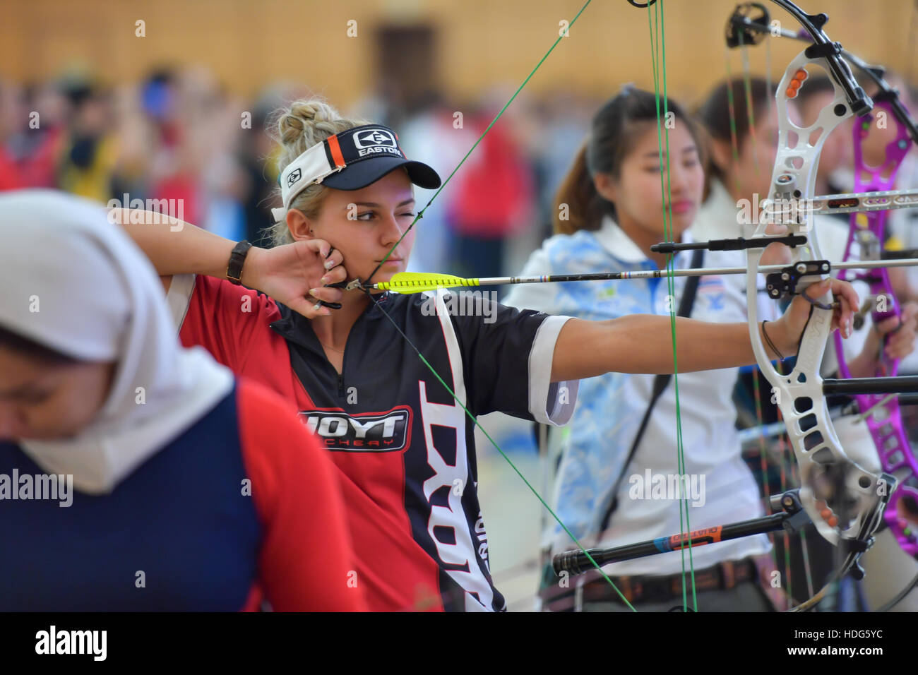 Bangkok, Thailand. 11th Dec, 2016.  Archers in a row and shoot in Indoor Archery World Cup at U-Tower Hall on December 11, 2016 in Bangkok, Thailand. Credit:  Chatchai Somwat/Alamy Live News Stock Photo