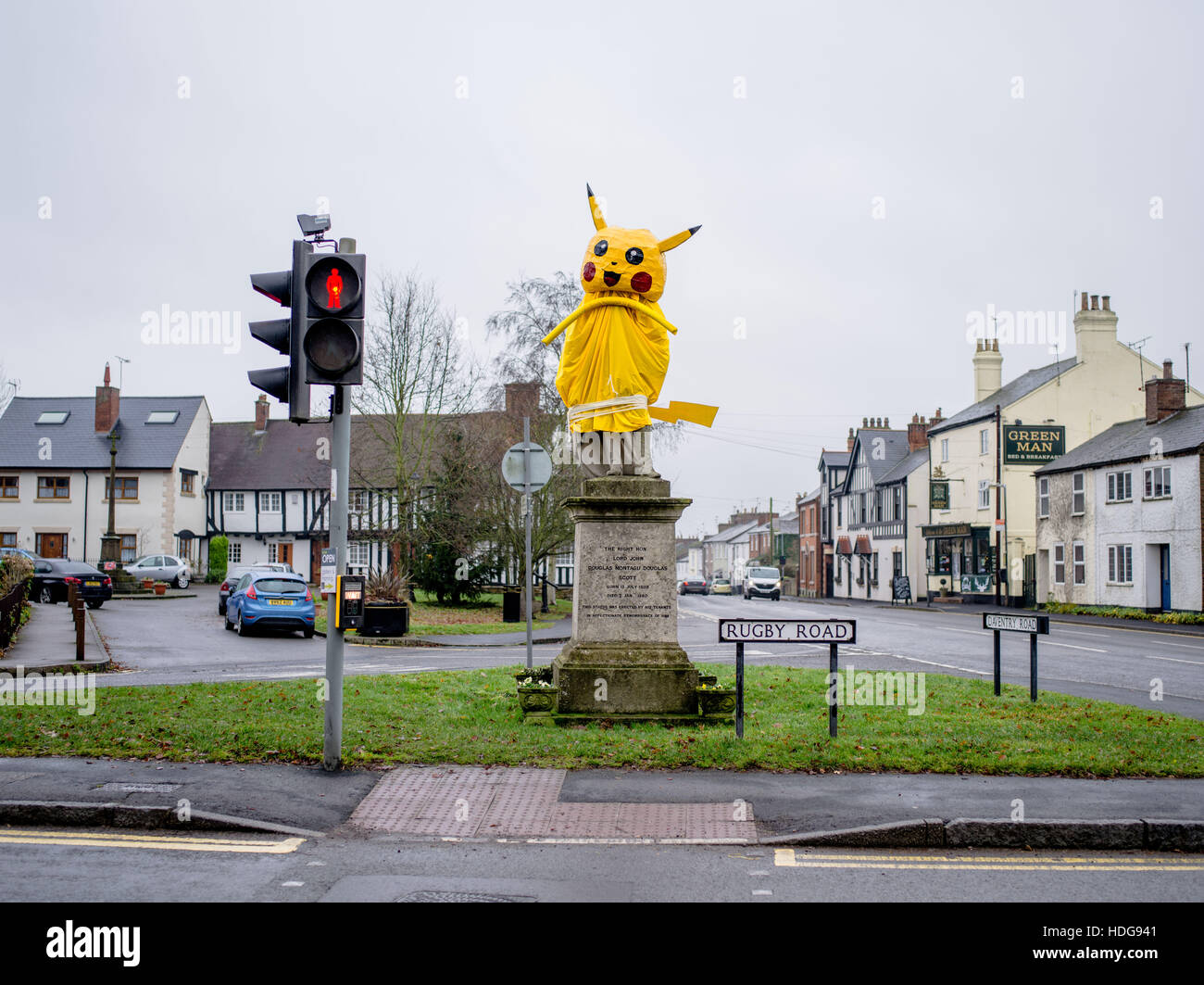 Dunchurch, Warwickshire, England. 12th December 2016. The statue of Lord John Scott in the village of Dunchurch has been covered in the disguise of Pokemon character Pikachu. In a tradition spanning decades, a secretive group of villagers dress the statue annually on the run-up to Christmas. The character chosen is normally someone who has made an impact in the year; in this case an homage to the social phenomena of Pokemon Go! Credit:  Jamie Gray/Alamy Live News Stock Photo