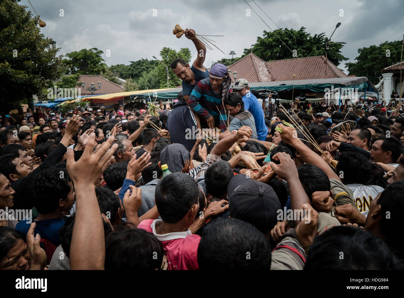Yogyakarta, Indonesia. 12th Dec, 2016. People jostle for the "Gunungan