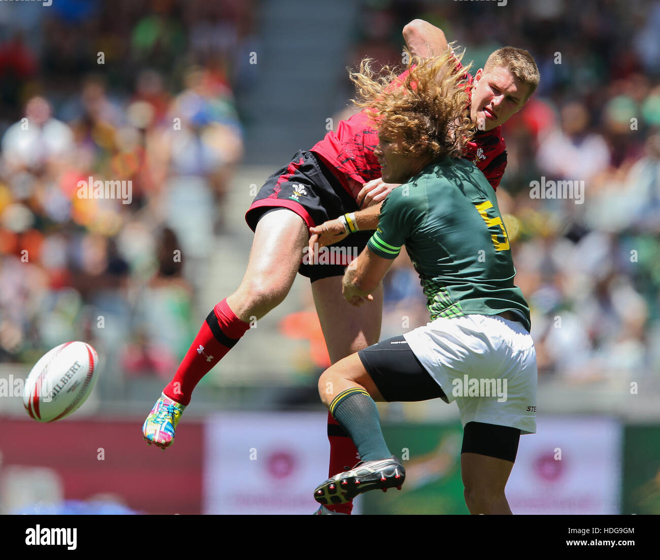 The SA Rugby Springbok Sevens players in action during the 2016 HSBC Sevens tournament at the Cape Town Stadium in Green Point Point, Cape Town. Stock Photo