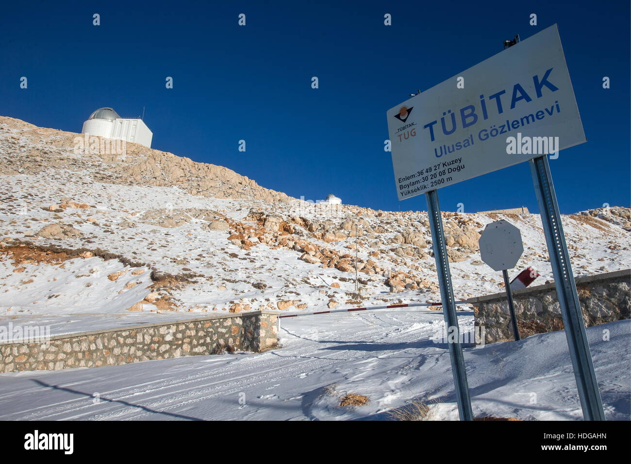 antalya turkey december 11 2016 a sign at the entrance to the tubitak national observatory tug located at an altitude of 2500m on mount bakirlitepe in saklikent district of the city