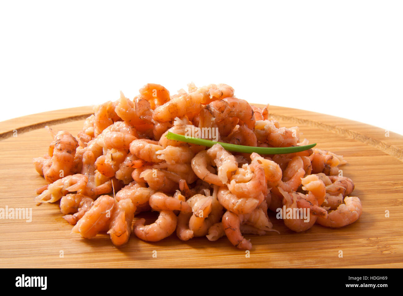 Shrimp on wooden plate with white background Stock Photo